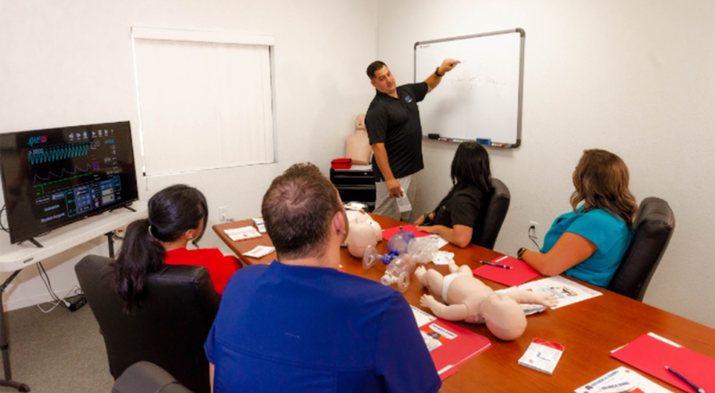 an expert and trained lead instructor teaching the staff nurses on how to properly conduct basic and advanced life support to adults and infants